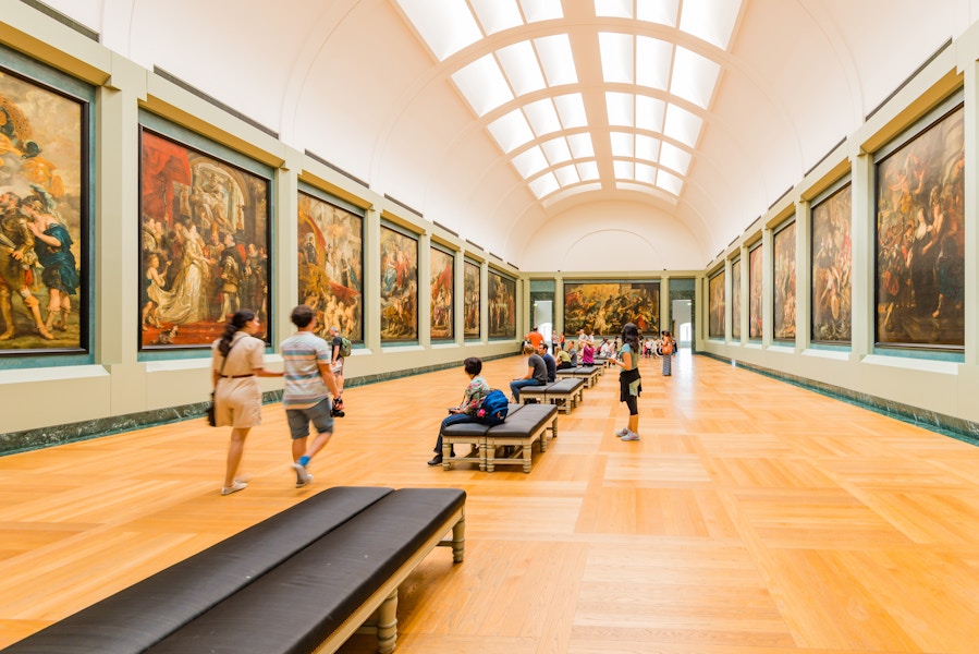 People inside the Louvre Museum in Paris, France.