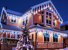 Christmas lights on the outside of a house 