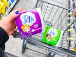 hand holding puffs tissues in walgreens
