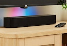 Onn Soundbar on an entertainment center