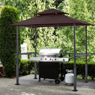 A brown gazebo tent covering a grill.