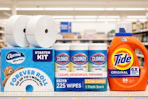charmin, clorox, and tide products on a shelf