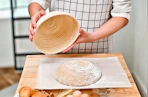 Lifestyle image of a sourdough kit being used to make bread