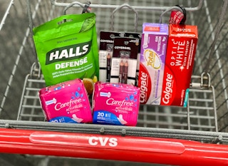 cvs shopping cart with halls, carefree, covergirl, and colgate