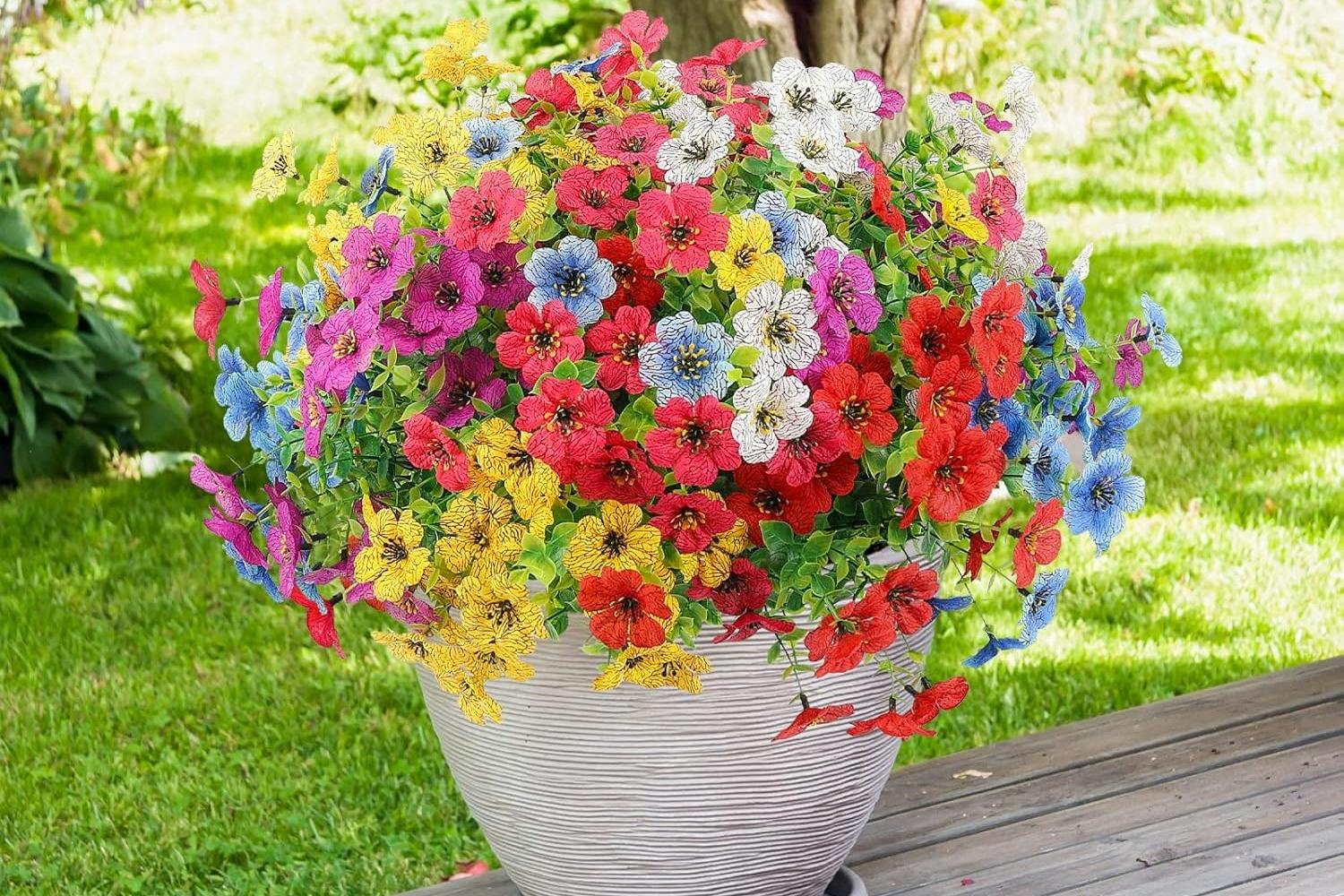 artificial flowers on a deck