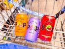 orange, grape, and watermelon Culture Pop Soda cans