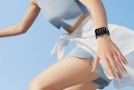 a woman wearing a smart watch