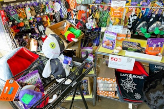 cart with halloween pet items by the display