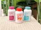three vitamin bottles