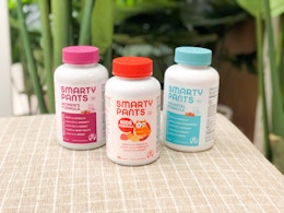 three vitamin bottles
