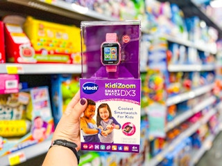 Hand holding kids smart watch