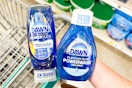 hand holding dawn dish soap and refill over shopping cart