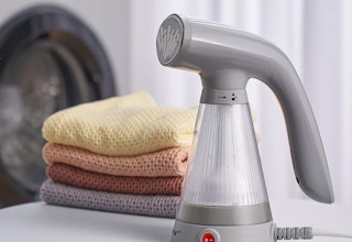 a handheld steamer on a counter