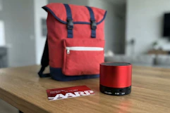 aarp membership card and two free gifts on a table