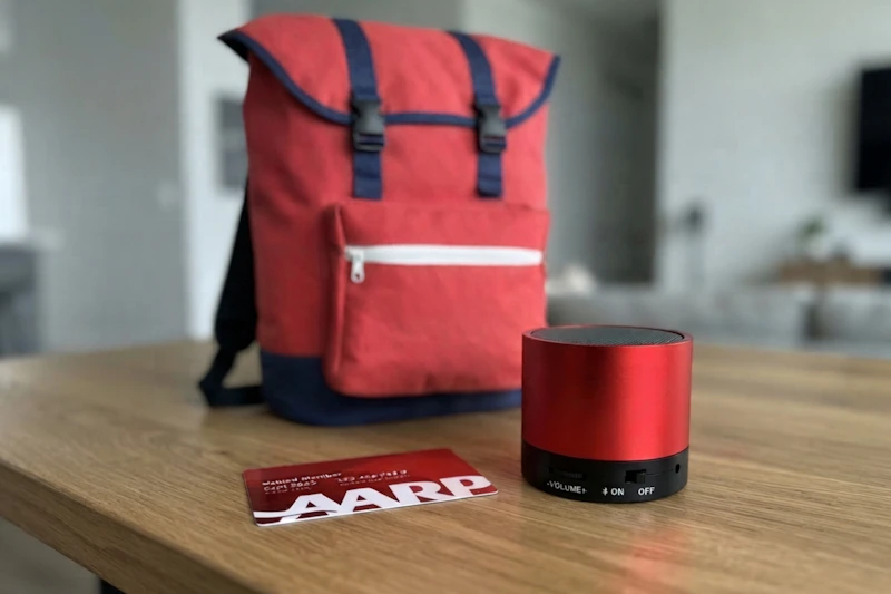 aarp membership card and two free gifts on a table