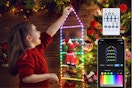 Girl hanging the Toodour Christmas Decorations Lights, 3.3ft Smart RGB Christmas Decorative Lights with Santa Claus.