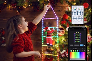 Girl hanging the Toodour Christmas Decorations Lights, 3.3ft Smart RGB Christmas Decorative Lights with Santa Claus.