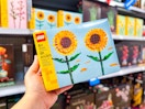 hand holding the Lego Sunflower building kit