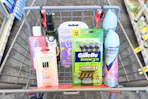 degree dry spray deodorant, gillette and venus disposable razors, sally hansen hard as nails, loreal toner, and herbal essences in a cart