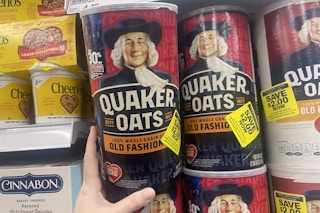 hand holding meijer quaker oats in store