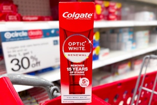 colgate optic white renewal toothpaste sitting on a target cart