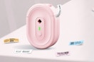pink label maker on table