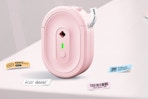 pink label maker on table