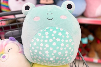An Easter frog Squishmallow in a Walgreens shopping cart with other squishmallows