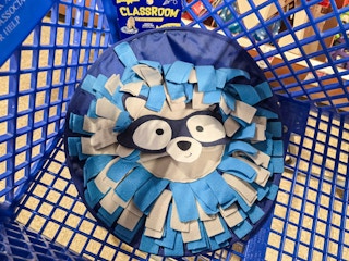 snuffle mat in a cart