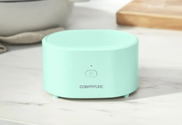 light blue Conair air purifier