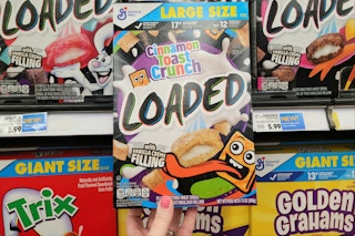 hand holding general mills cereal
