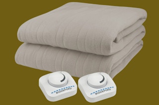 Folding up Biddeford Electric Blanket in the color taupe