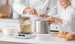 a chef and kid using a sourdough warmer