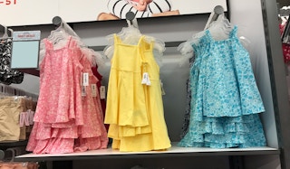 girls dresses in store on hangers