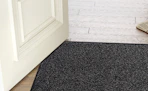 a door mat at a door 