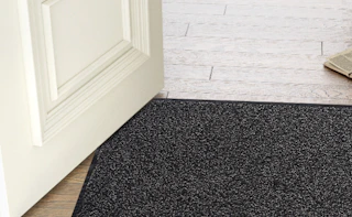 a door mat at a door 