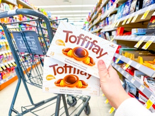 hand holding toffifay candy in walgreens