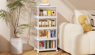 a storage bin with books and decor in a room