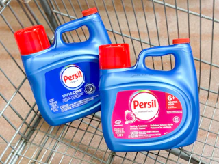 2 persil laundry detergent bottles sitting in a walmart cart