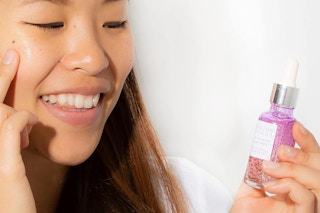 a woman using physicians formula serum