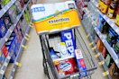 shopping cart with bounty, pepsi, charmin, purex, and walgreens brand items