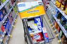 shopping cart with bounty, pepsi, charmin, purex, and walgreens brand items