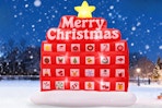 PETUOL Christmas Advent Calendar Inflatable outside in the snow at night.