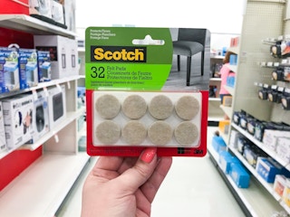 hand holding scotch felt pads at target