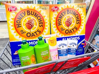 shopping cart with cereal, hair care, toothpaste, and hand cream