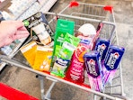 air wick warmer, bandages, gillette razor, irish spring and softsoap body washes, and crest toothpaste in a cart