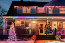Smart RGB+IC Permanent String Lights Indoor and outdoor 76ft on a house in the winter.
