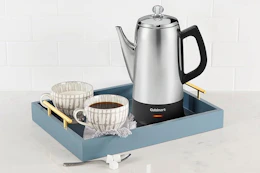 a cuisinart percolator near coffee