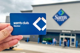 someone holding a sams club member card