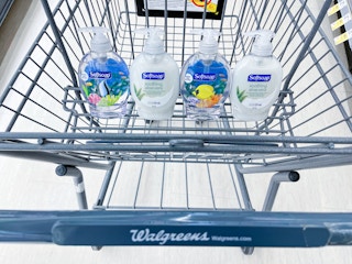 shopping cart with four bottles of Softsoap hand soap